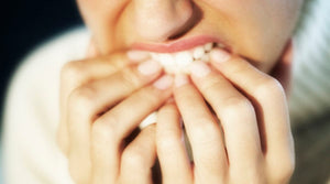 Here’s How to Break Your Nail Biting Habit Successfully